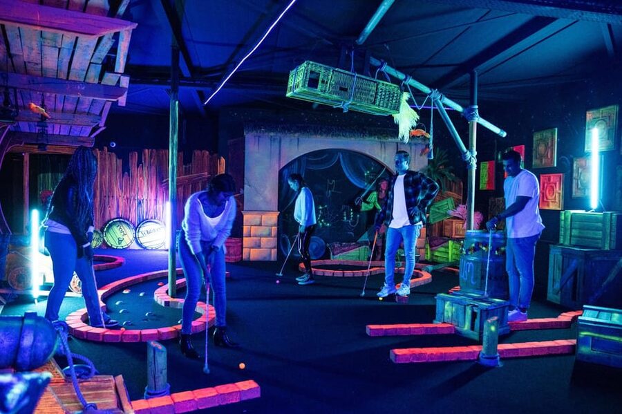 Aloha Amsterdam: 12-Hole Glow-in-the-Dark Mini-Golf - Playing with children, couples, and larger groups