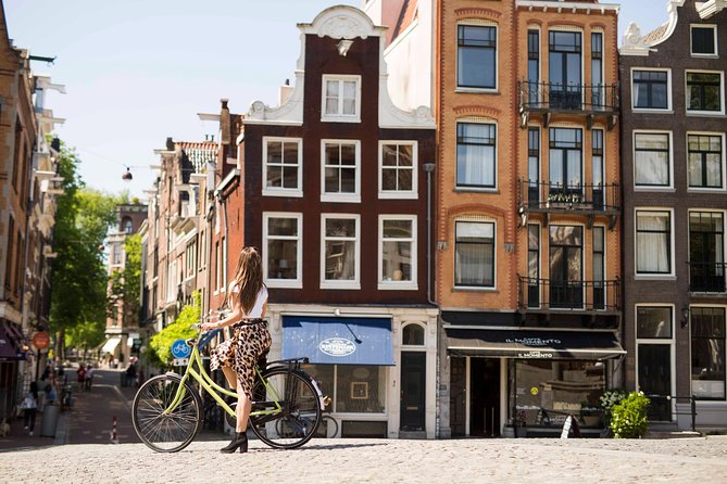 Amstagram Tour & Moco Experience - The drunken houses along the Amstel