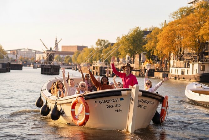 Amsterdam 1-Hour Canal Cruise With Live Guide - Houseboats, local shopping, and the lively Leidseplein area