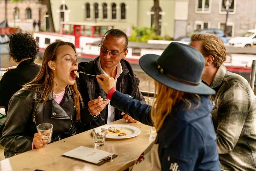 Amsterdam: 10 Tastings Guided Food Tour by UNESCO Canals - Walking the UNESCO canals with food in hand