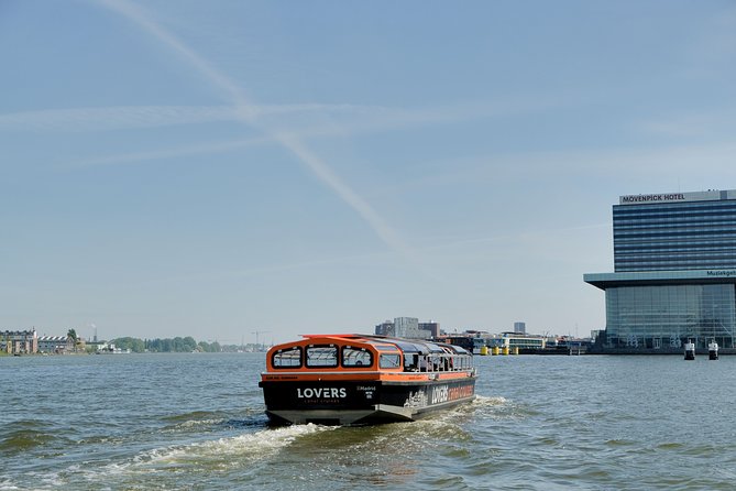 Amsterdam 1h Canal Cruise by Semi-Open Boat with Audio Guide - The Red Light District and Munt Tower
