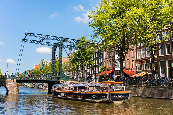 Amsterdam 1h Canal Cruise by Semi-Open Boat with Audio Guide - The audio guide and live commentary