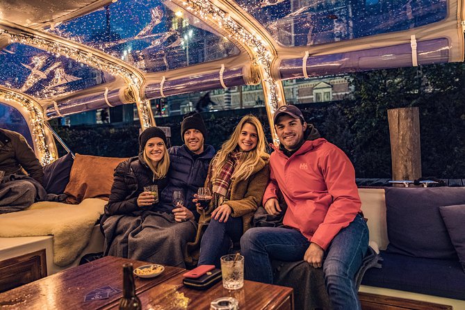 Amsterdam 2-Hour Evening Cruise With Live Guide and Bar - Central Station, Sea Palace, and sunset views