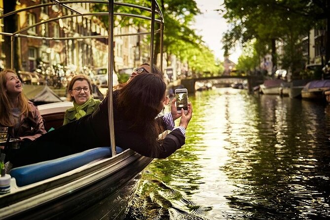 Amsterdam 2-hour Private Canal Cruise with Live Guide and Drinks - Why a private boat changes Amsterdam