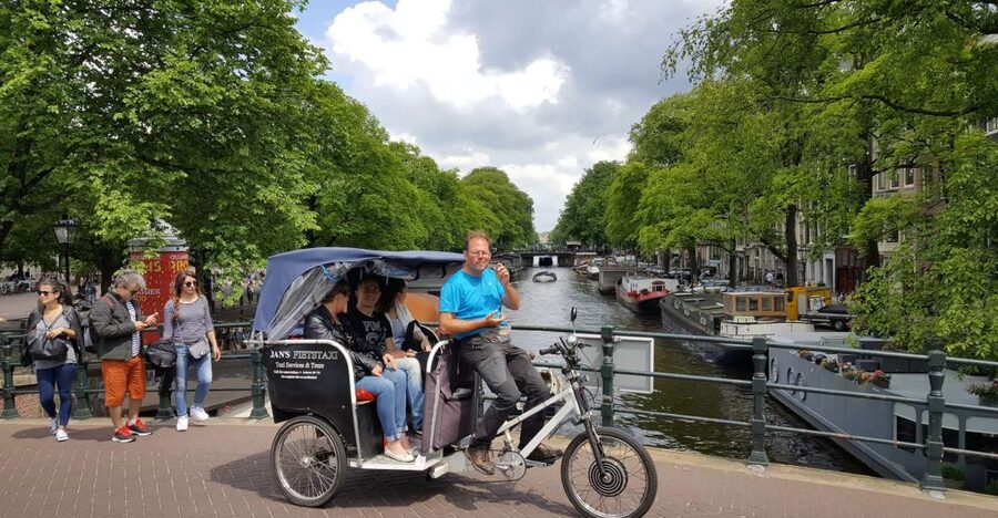 Amsterdam: 2-Hour Sightseeing Tour by Rickshaw - Canal streets and Amsterdam’s historic houses