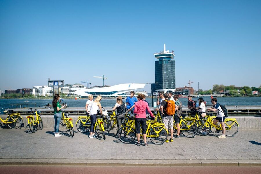 Amsterdam: 3h E-Bike Tour with break - Leaving Central Station for the old city