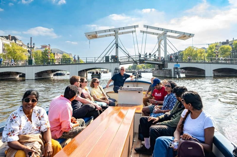 Amsterdam: 75 minute Open Boat Canal Cruise with Live Guide - Why a small open boat changes the Amsterdam canal ride