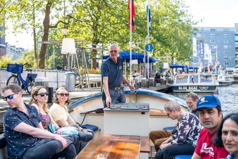Amsterdam: 75 minute Open Boat Canal Cruise with Live Guide - From Leidseplein to the first city views