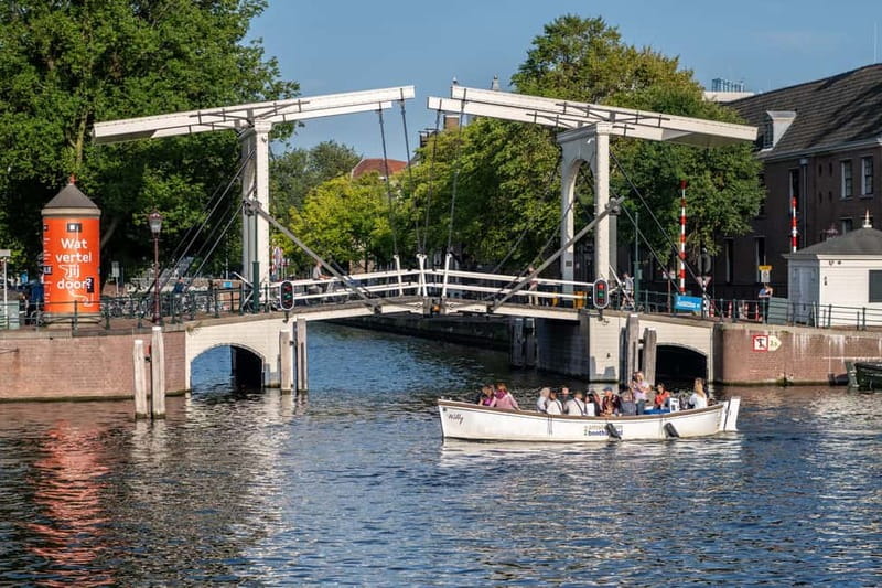 Amsterdam: 75 minute Open Boat Canal Cruise with Live Guide - Westerkerk and Prinsengracht from the water