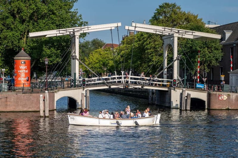 Amsterdam: 75 minute Open Boat Canal Cruise with Live Guide - What the live guide adds