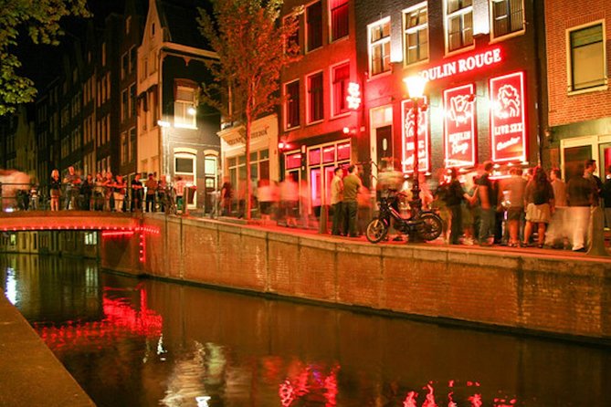 Amsterdam After Dark: Public Red Light District Exploration - The famous red windows and the women behind them