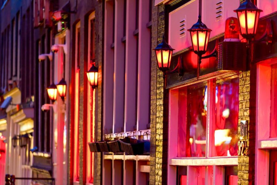 Amsterdam: After Dark Red Light District Tour - The Oude Kerk: a serious opening in a lively district