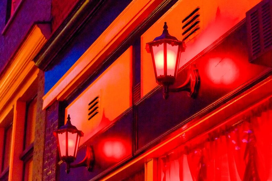 Amsterdam: After Dark Red Light District Tour - Red-lit windows, sex work, and privacy