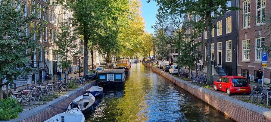 Amsterdam All In One Tour Walking Tour - Weather, walking, and practical comfort