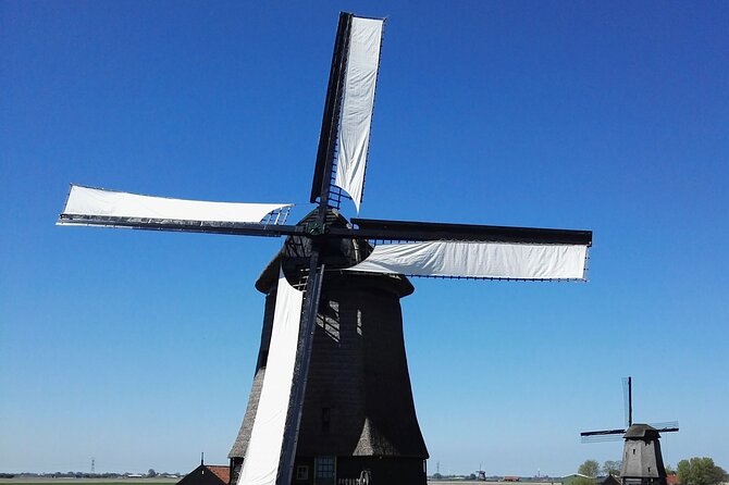 Amsterdam and Countryside Private Full-Day Tour by luxury car - Starting with Amsterdam’s historic center