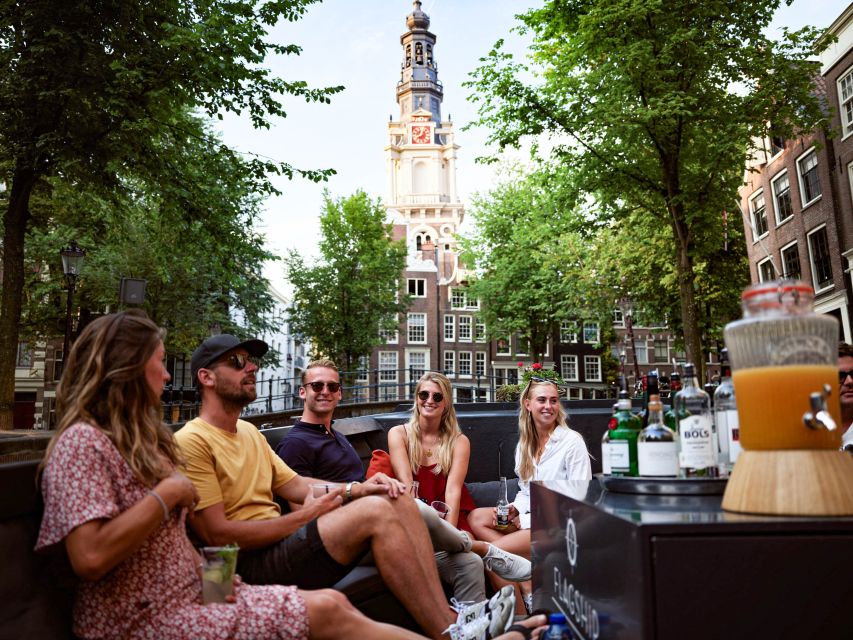 Amsterdam: Canal Belt Private Beer Boat Tour - Beer, cushions, and a relaxed party mood