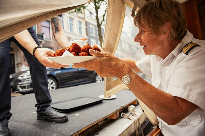 Amsterdam Canal Cruise and local Food Tour - Seeing Amsterdam from a restored wooden saloon boat