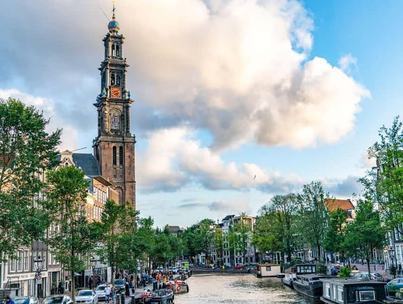 Amsterdam: Canal Cruise from Anne Frank Museum - What the boat is like in sun, rain, and cold
