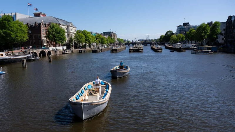 Amsterdam: Canal Cruise in Open Boat with Drink Option - Why seeing Amsterdam from the canals matters