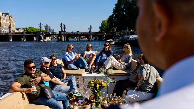 Amsterdam: Canal Cruise in Open Boat with Drink Option - Westerkerk, Prinsengracht, and the Negen Straatjes