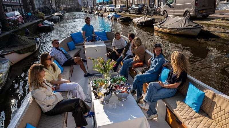 Amsterdam: Canal Cruise in Open Boat with Drink Option - Carré, Magere Brug, and the eastern canal views