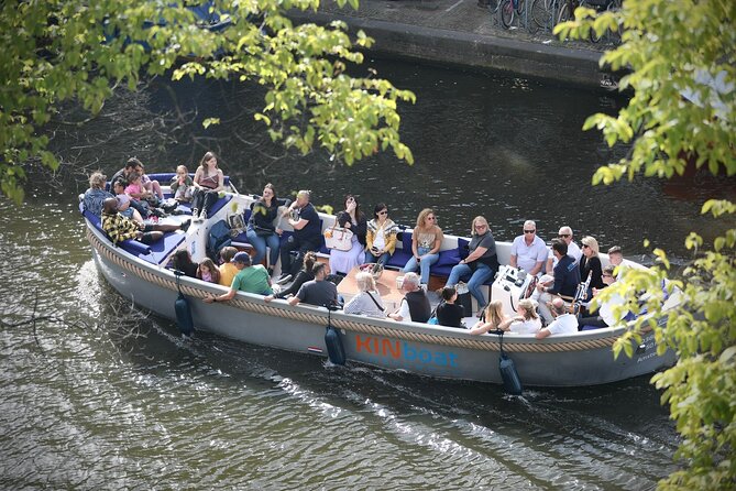 Amsterdam Canal Cruise in Open Boat with Unlimited Drinks Option - Open Boat Comfort in Cold or Wet Weather