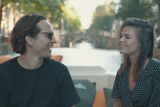 Amsterdam Canal Cruise with German Guide and unlimited drinks - Houseboats and the quiet side of Amsterdam