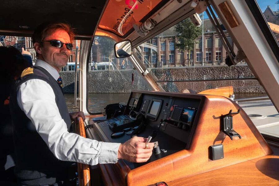 Amsterdam: Canal Cruise with Live Commentary & Audio Guide - The Amstel and the Skinny Bridge