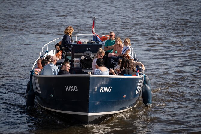 Amsterdam Canal Cruise with Live guide & Two drinks - Central St. - Rain, weather, and onboard comfort