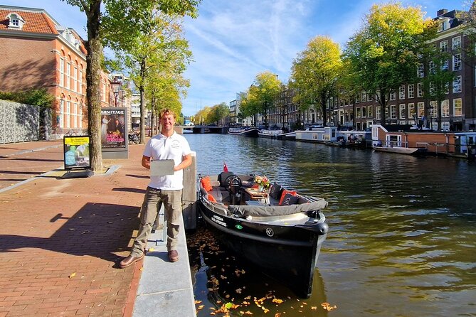 Amsterdam Canal Tour by Open Boat – 90 min Small Group Experience - Geldersekade, Nieuwmarkt, And De Waag
