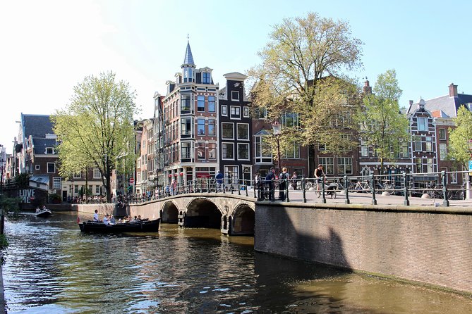 Amsterdam Canal Tour by Open Boat – 90 min Small Group Experience - The Canal Belt And Seven Bridges Canal