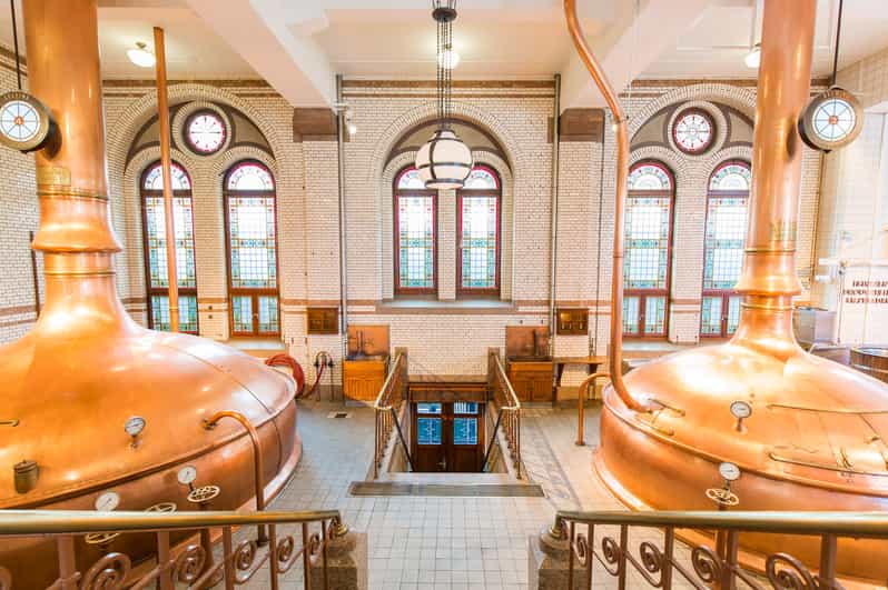 Amsterdam: City Canal Cruise and Heineken Experience Ticket - The audio guide and the boat atmosphere