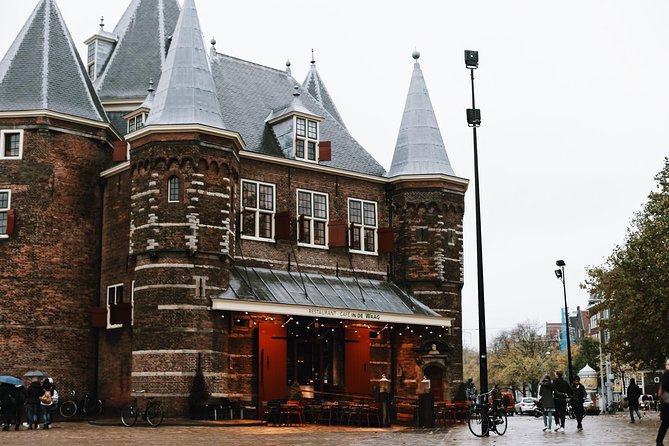 Amsterdam City Center Guided Walking Tour Semi-Private 12ppl Max - Narrow houses and the Dutch East India Company