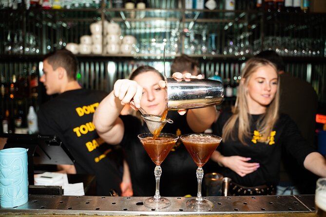 Amsterdam: City Centre Bar Crawl and Nightlife Experience - Stop one: The Black Tiger Bar and the opening hour