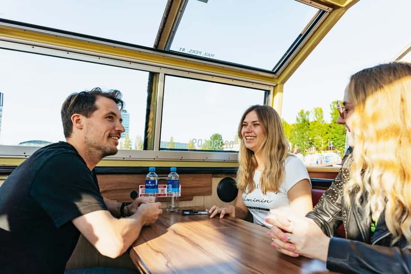 Amsterdam: City Centre Canal Cruise & Free Flower Cocktail - Commentary, languages, and sound quality