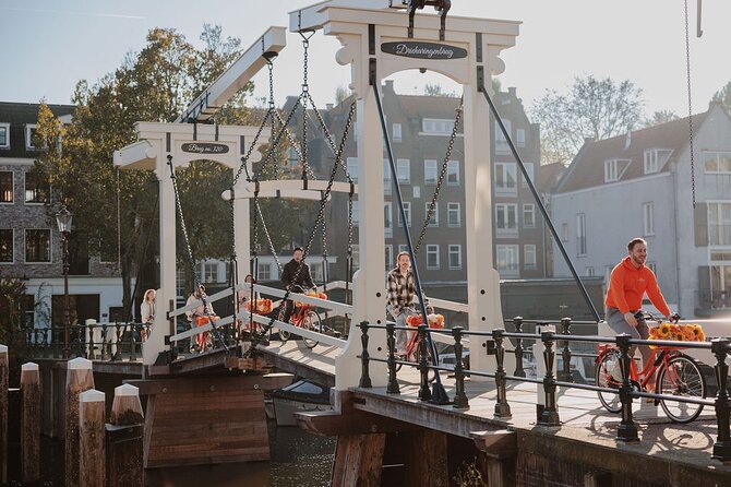 Amsterdam City Top Highlights Guided Bike Tour - Leidseplein and Dam Square finish