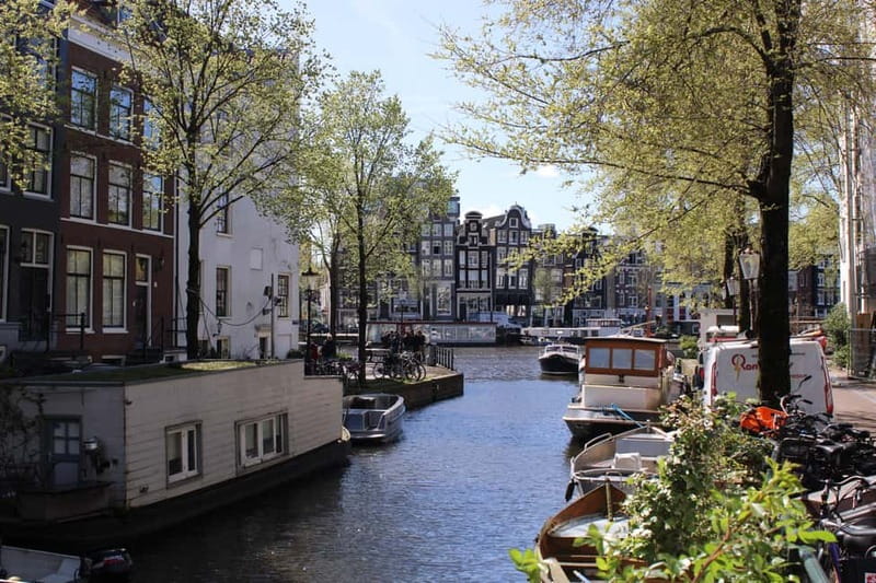 Amsterdam: City walking experience with a local - Canals, bicycles, and Amsterdam’s practical side