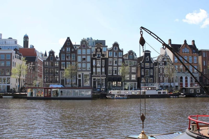 Amsterdam: City walking experience with a local - Amsterdam Centraal and the return to Beursplein