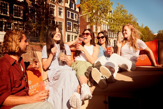 Amsterdam Classic Saloon Boat Canal Cruise with Live Guide - Open boat or classic saloon boat