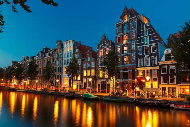 Amsterdam Evening Canal Cruise with Live Guide and Onboard Bar - The Amstel, Royal Theatre Carré, and the city center