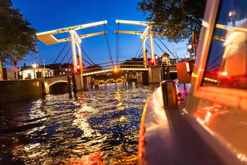 Amsterdam: Evening Cruise with Optional Wine and Snacks - Snack boxes, wine, and the $22 price