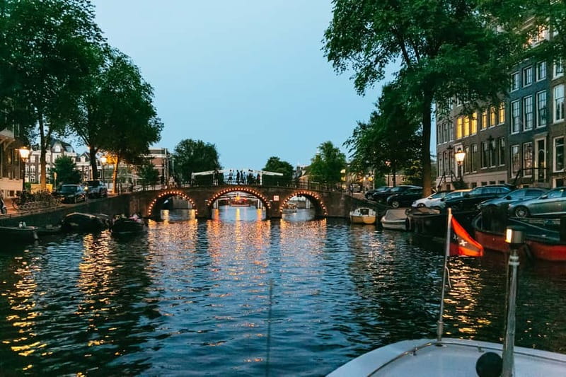 Amsterdam: Evening Cruise with Optional Wine and Snacks - Amsterdam Centraal, the EYE Film Institute, and ADAM Tower