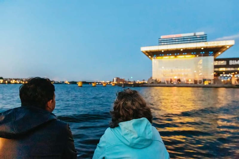 Amsterdam: Evening Cruise with Optional Wine and Snacks - Audio commentary, captains, and the onboard mood