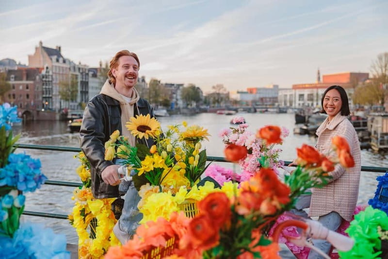 Amsterdam: Explore Canals, Guided Tour on Flower Bikes - Passing the Anne Frank House with time for reflection