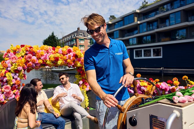 Amsterdam Flower Boat Canal Cruise with Local Guide - Meeting the boat near Oudezijds Voorburgwal