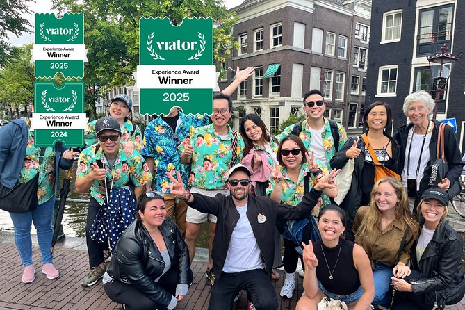 Amsterdam Food and Cultural Tour with Tastings - Bloemenmarkt: flowers, souvenirs, and city orientation