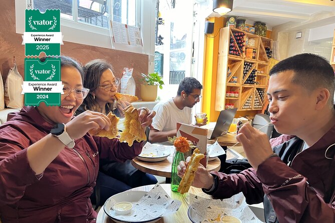 Amsterdam Food and Cultural Tour with Tastings - Monarchy and the stories behind Amsterdam’s crooked houses