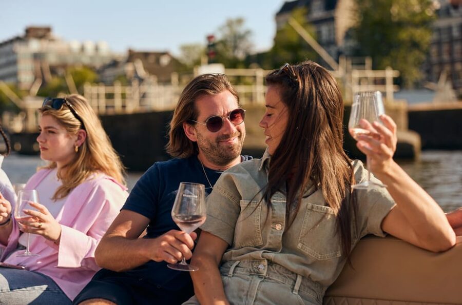 Amsterdam: German Guided Canal Cruise with on Board Bar - Munttoren and the old city center