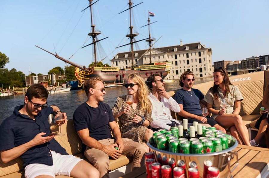 Amsterdam: German Guided Canal Cruise with on Board Bar - Basilica of Saint Nicholas and Amsterdam’s changing skyline