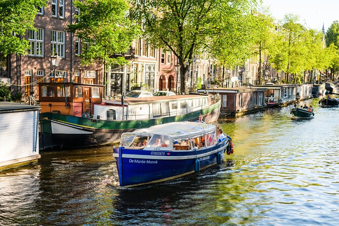 Amsterdam: German-speaking boat trip with bar on board - Key points at a glance
